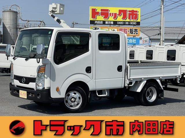 平成28年式日産アトラス1.25t全低床Wキャブ・5速MT・ガソリン車・電動格納ミラー・キーレ...